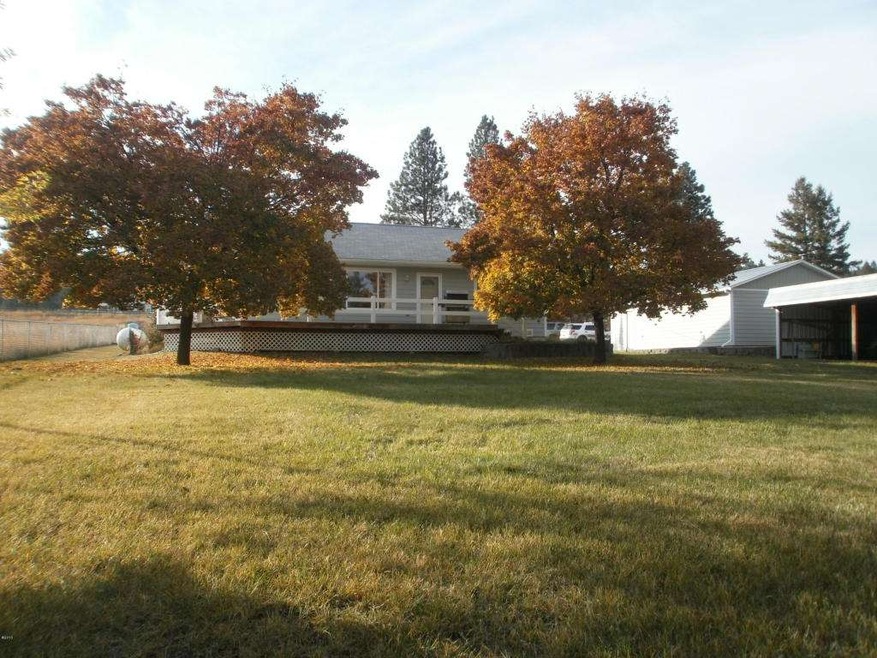 House and Large Front Yard