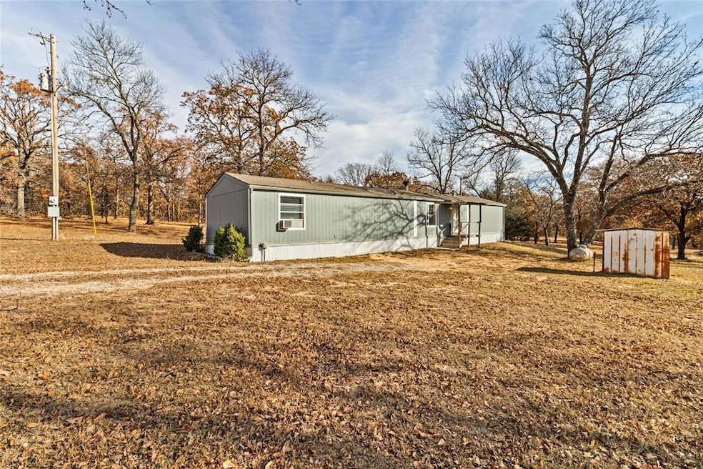 33711 Dutton Rd, Wanette, OK 74878 - photo 1