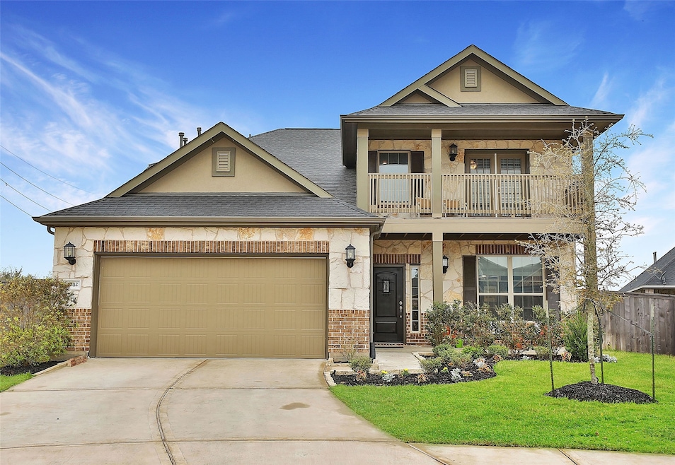 Gorgeous Lennar Terrazzo II model with welcoming front porch and upstairs balcony