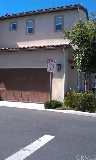 CORNER CONDO WITH GARAGE BELOW