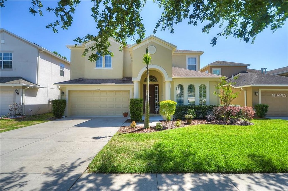 On a GORGEOUS lot w/NO BACK-YARD NEIGHBORS sits th