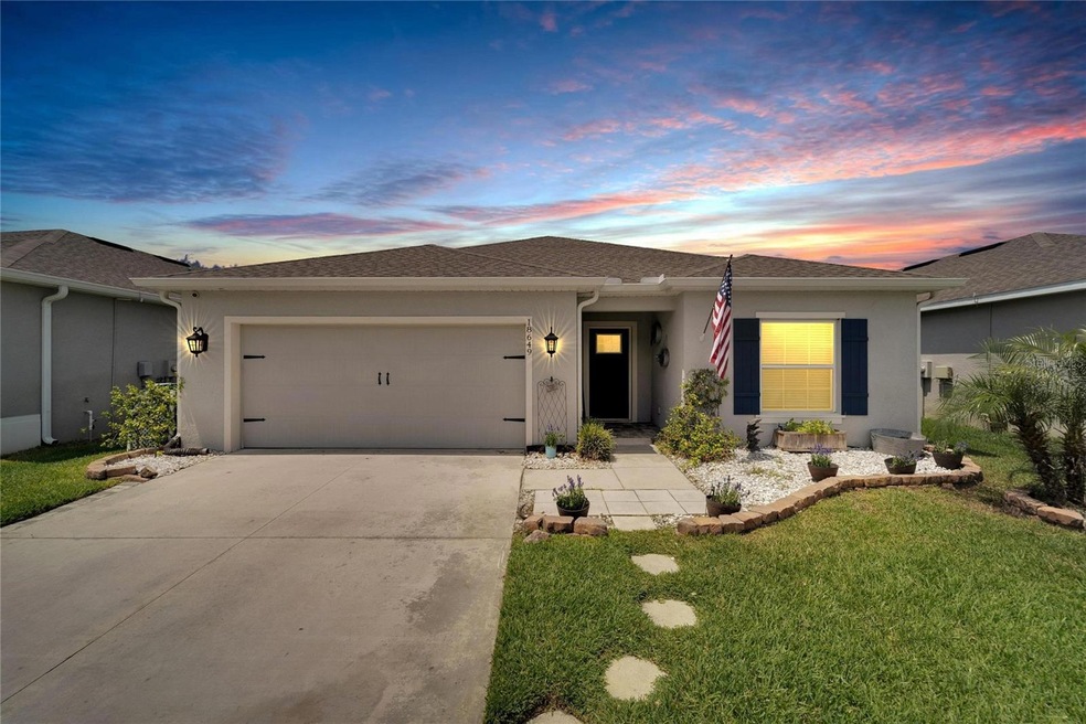 18649 Hunters Meadow Walk, Land O' Lakes, FL 34638 - photo 1