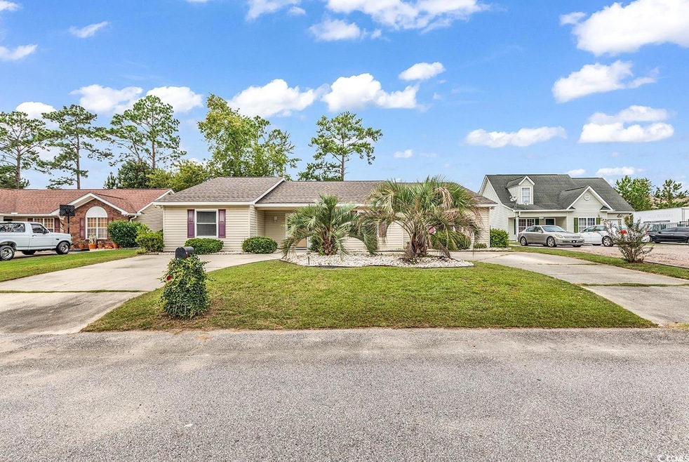 View of front of house with a front yard