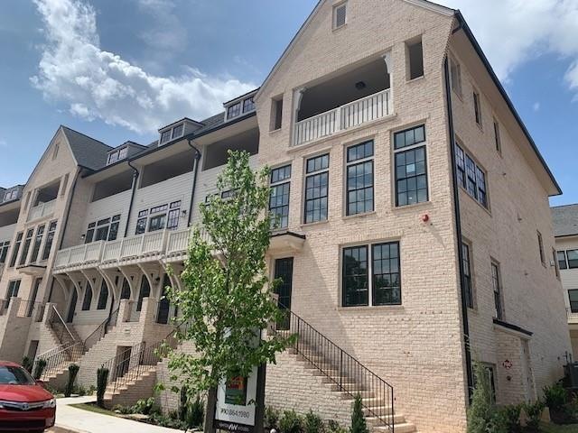 Beautiful European exterior on this townhome. Beau