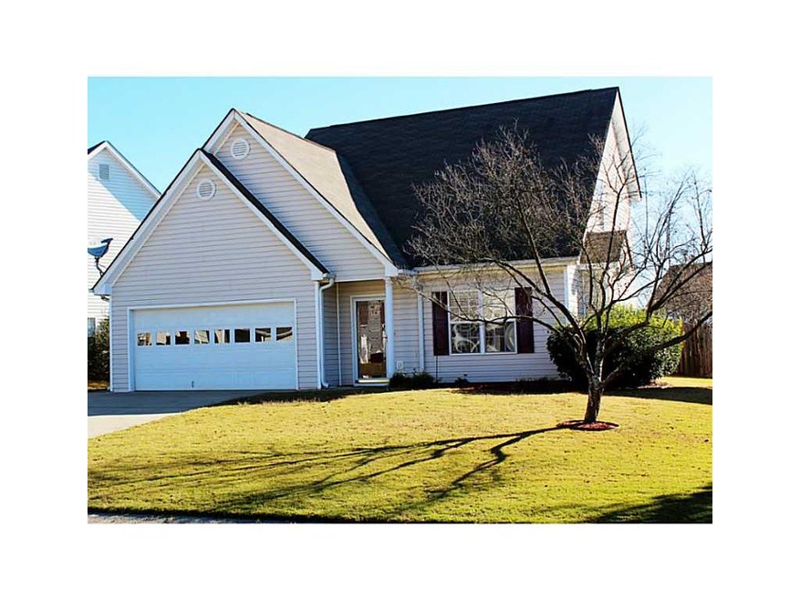Exterior Front. Charming one and a half story cott