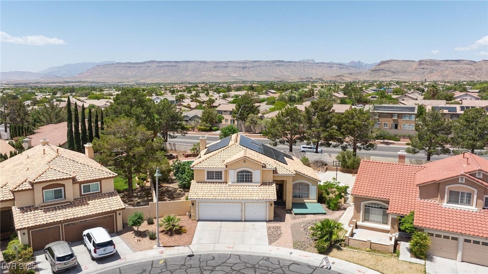 Aerial perspective of suburban area featuring moun