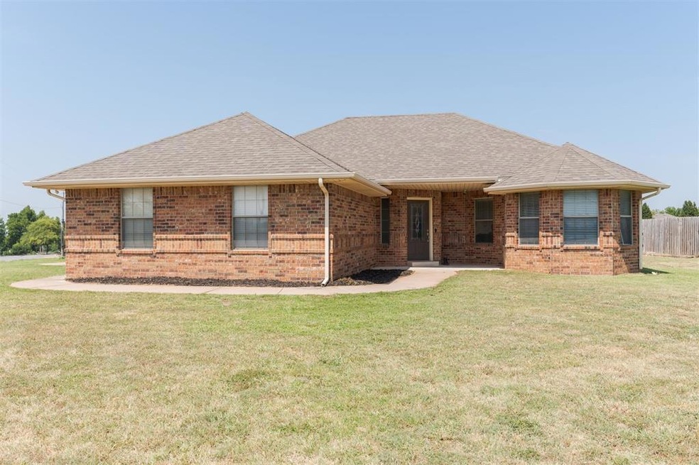 Ranch-style home with a front lawn