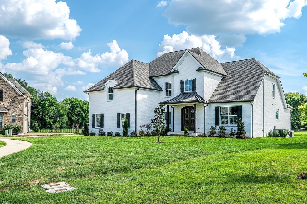Elegant, painted-brick home by Landmark Building Company.