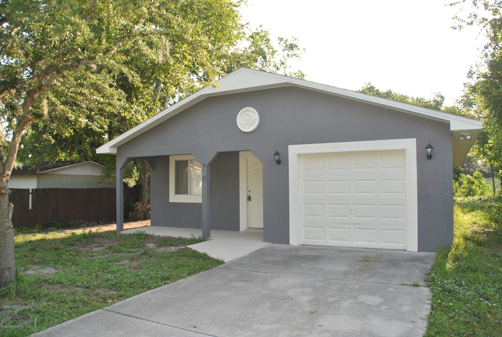 409 S Robbins Ave, Titusville, FL 32796 - photo 1