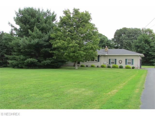 Set well back from the road this home has a countr