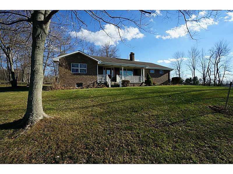 Exterior Front. With a welcoming front porch, this