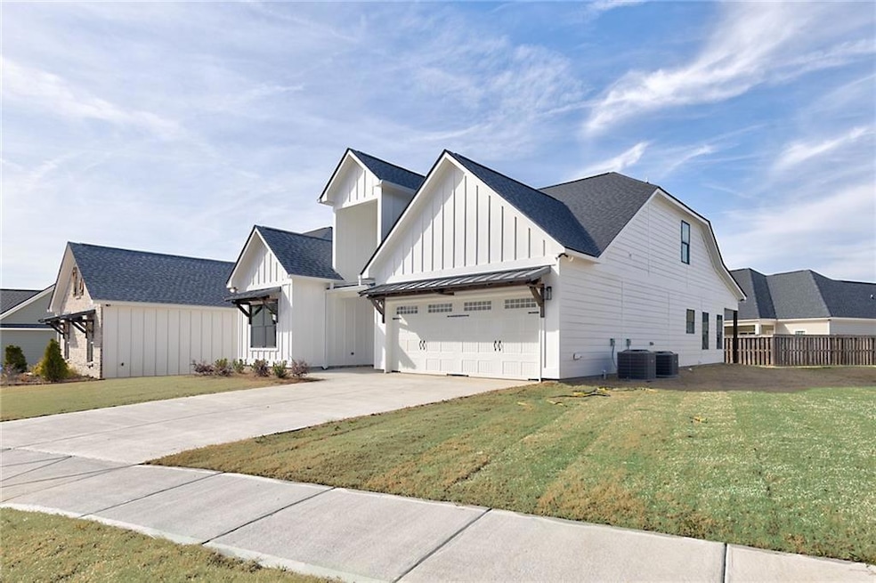 View of front of house featuring a garage, a front