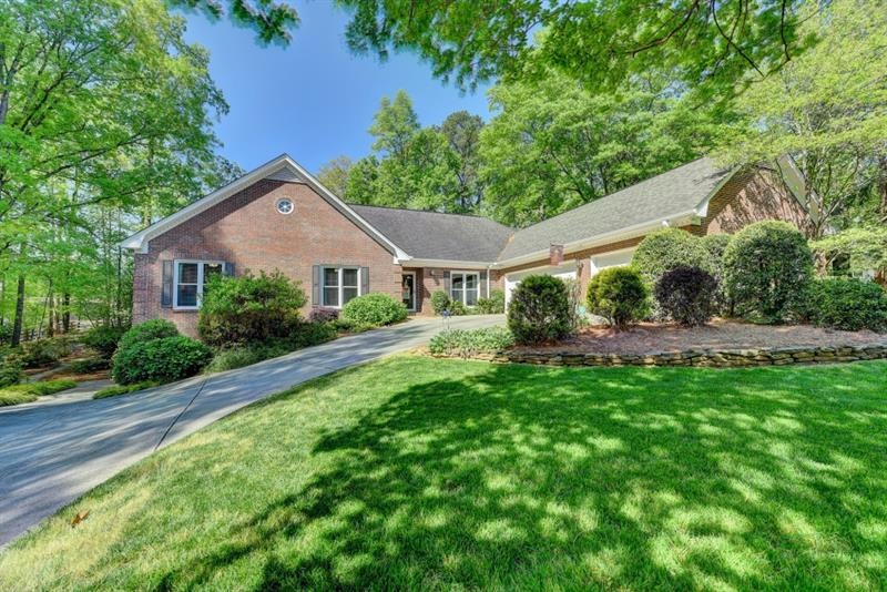4 sided brick ranch in coveted Simpson Elementary!