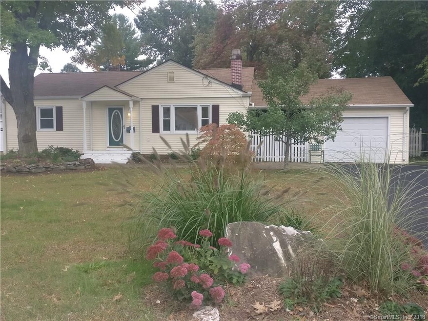 Front view of property and landscaping
