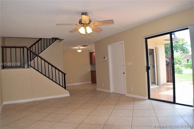 View Living/Dining Room plus Patio.