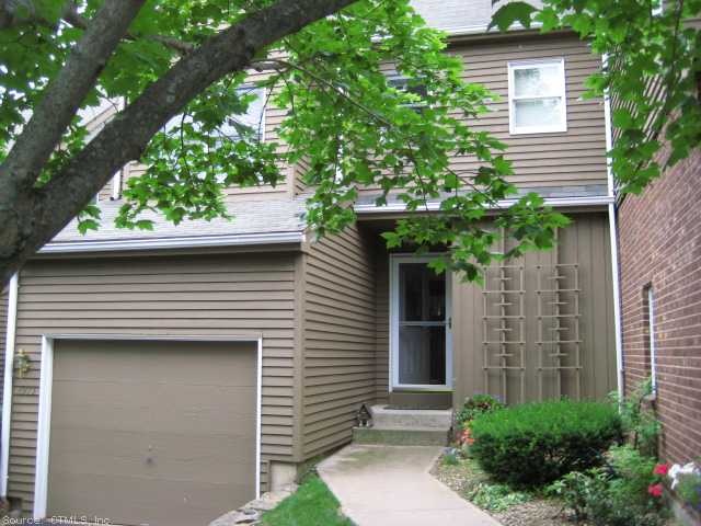 Exterior Front. Small (34 units), custom complex s
