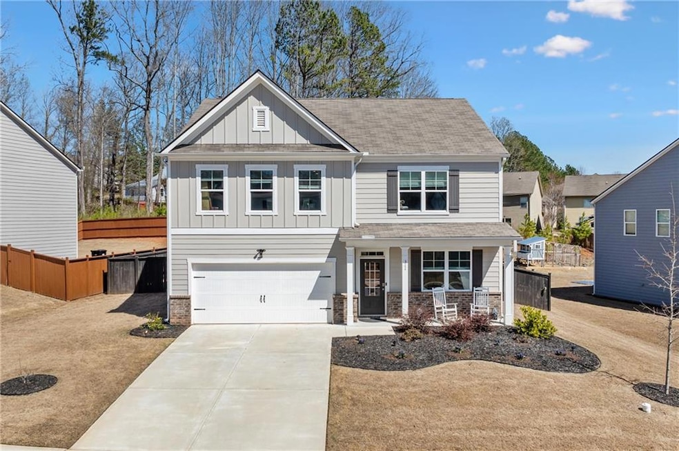 Craftsman inspired home featuring board and batten