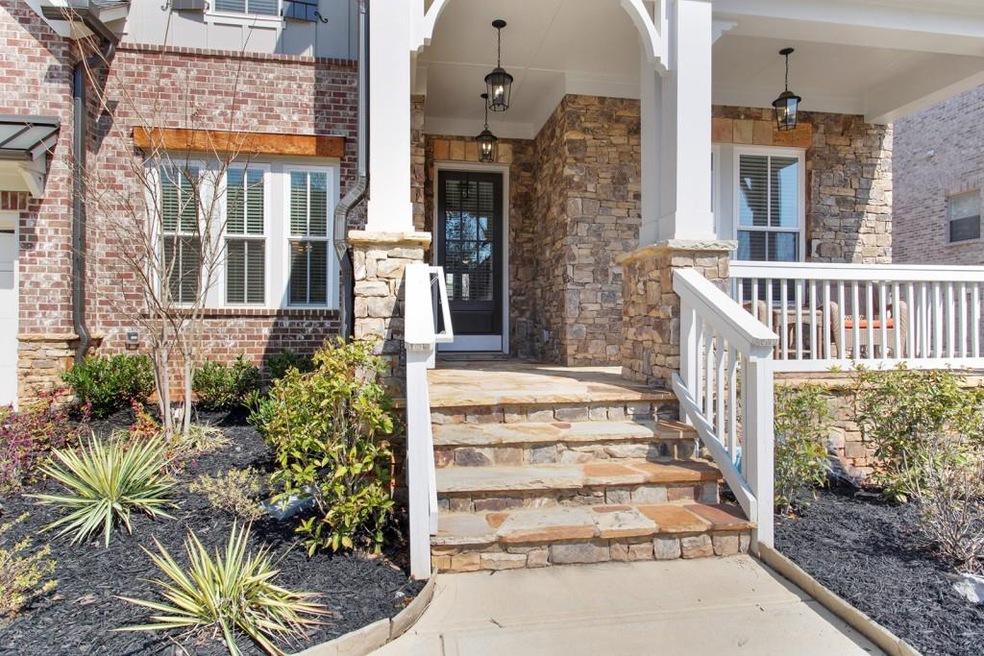 Charming Exterior Details include Rustic Wood Beam