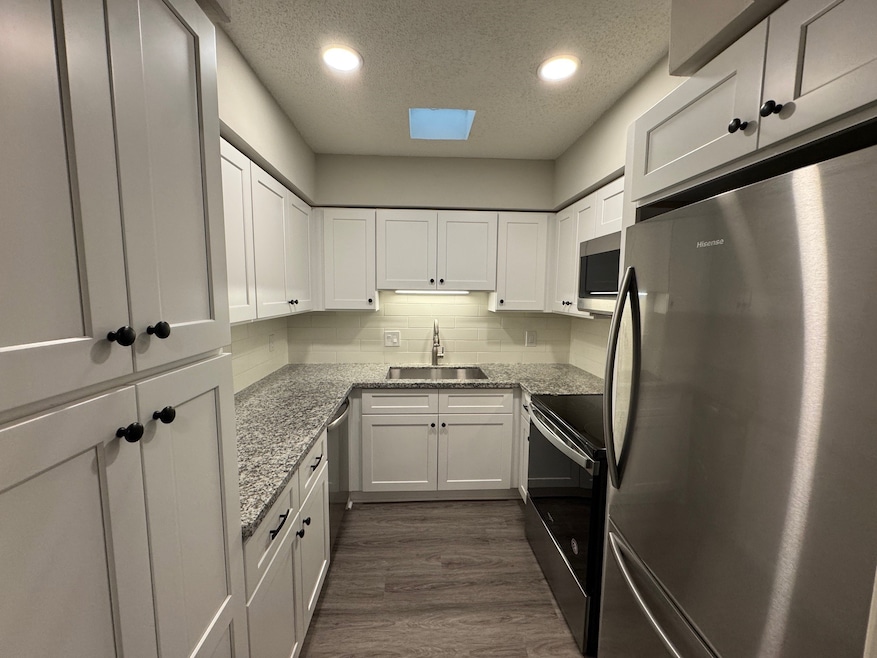 Kitchen with shaker style cabinets