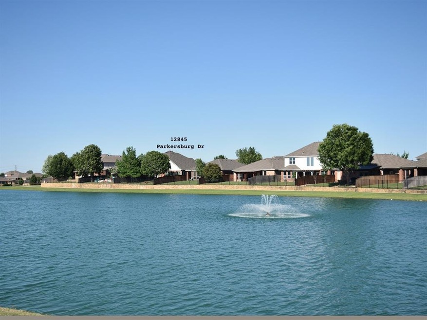 Home backs to Community Pond with Fountain