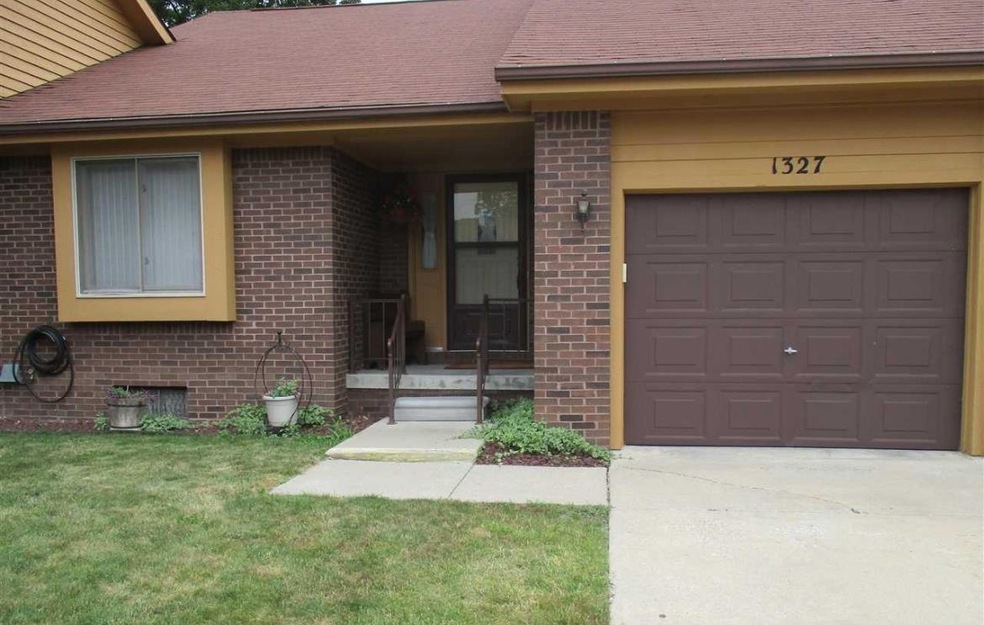 1327 Leisure Dr, Flint, MI 48507 - photo 1