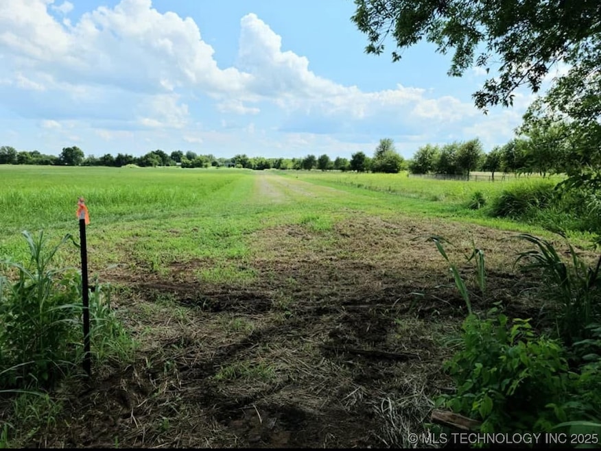 Enter the property from the paved 445 Rd maintained by the county. You could add a gate or some trees for a beautiful driveway back to your home.