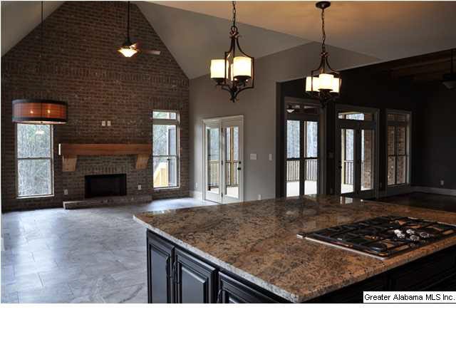 All photos are of similar house plan that was built. Need to see specs for details.  Large open kitchen to hearth room, breakfast, and great room