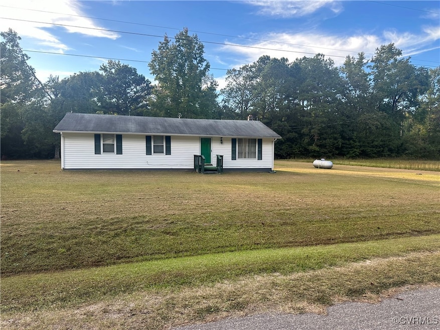 View of front of home featuring a front lawn
