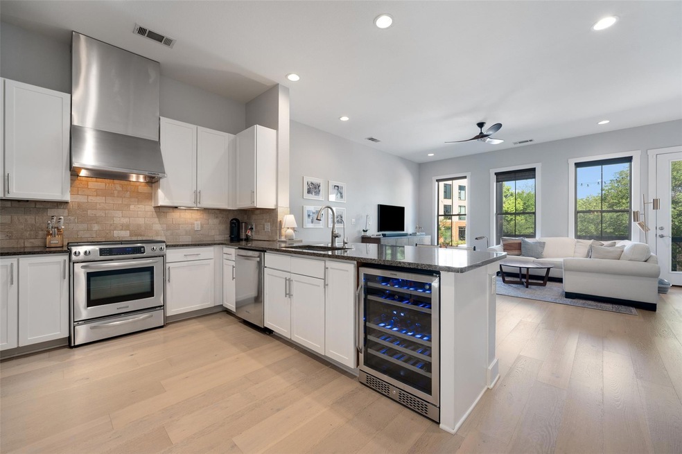 Kitchen featuring stainless steel appliances, win