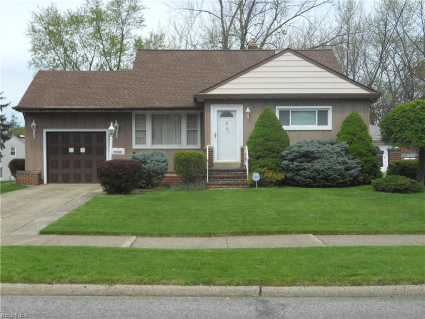 Great curb appeal. Well maintained yard.