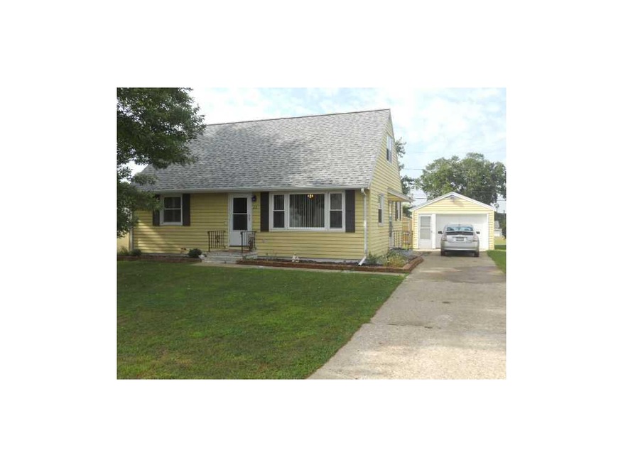 Front Exterior. Brand new roof, aluminum siding