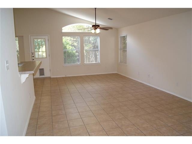 Open Living to Dining to Kitchen, All with Tile Fl