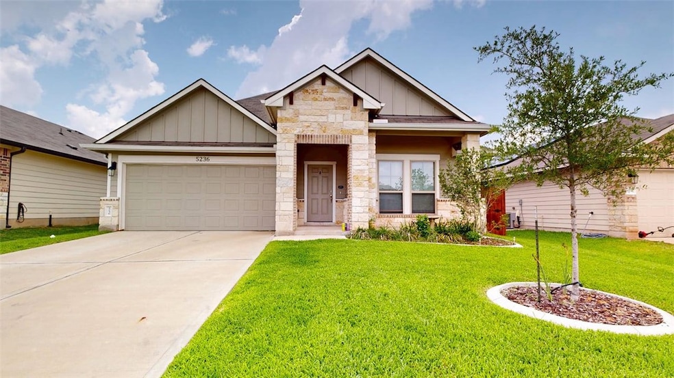 Craftsman-style home with board and batten siding,