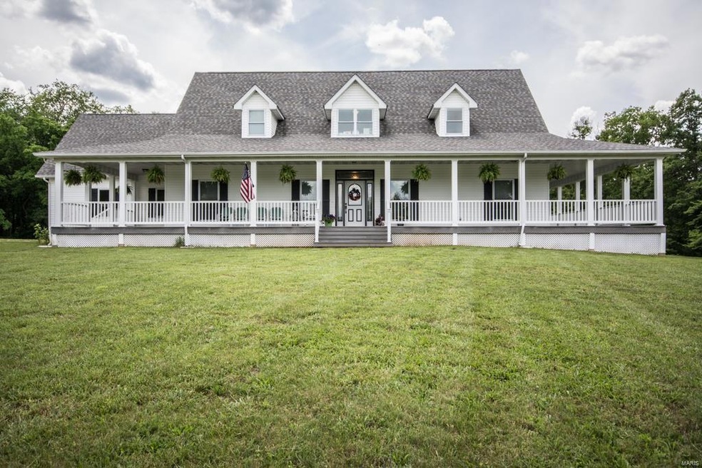 Gorgeous Home with Full wrap around porch..