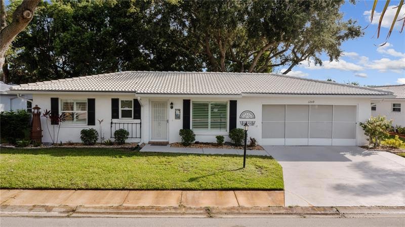 Welcome Home! A well loved 2BR, 2BA, 2CG in 55+ River Isles Golf Community.