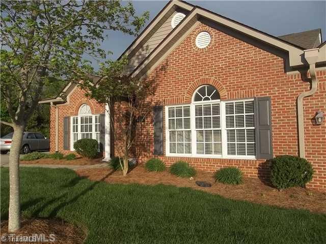 Exterior Front. Gorgeous all brick end unit townhome with side entry garage!