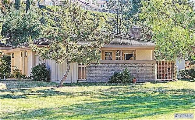 Charming single story home tucked away from the hu