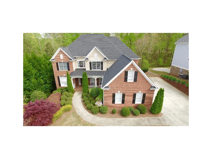 Four sided brick residence with 3 car garage on a 