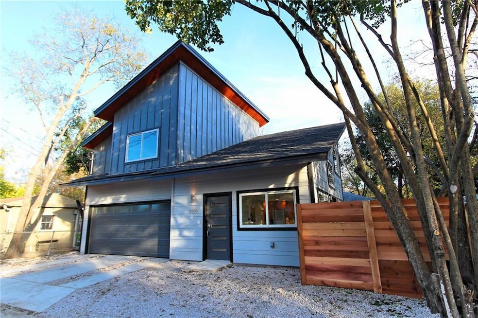 View of property exterior featuring board and bat