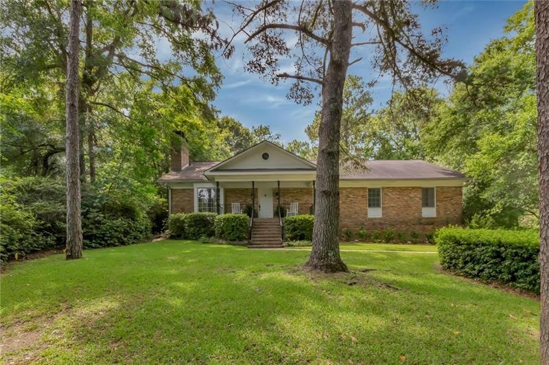 Impeccable home with mature landscaping in a terri