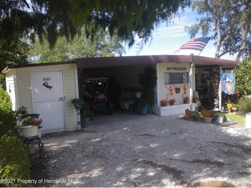 9281 Grizzly Bear Ln, Weeki Wachee, FL 34613 - photo 1