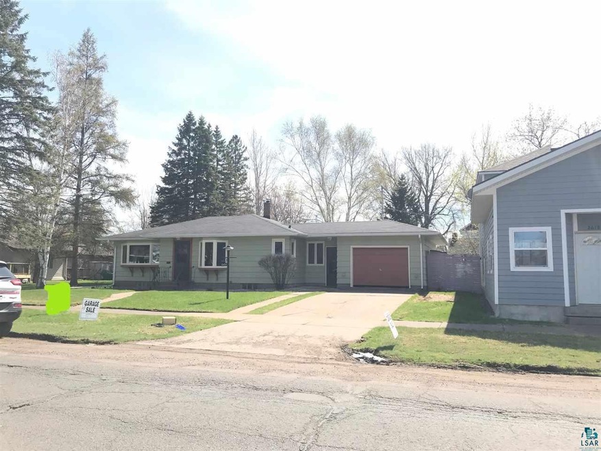 Great front yard with beautiful birch trees!