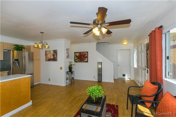View of the open layout living room as you enter f