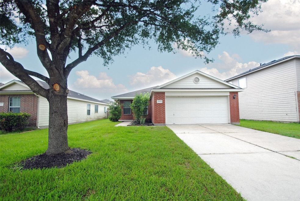 Charming single-story home with a brick exterior,