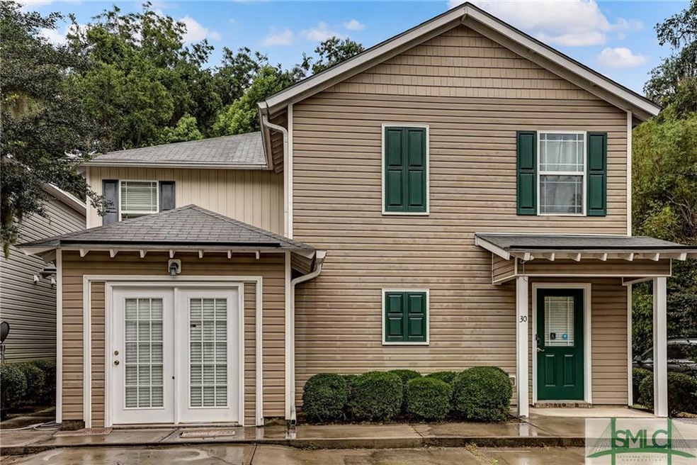 Unit is on far right where green shutters are loca