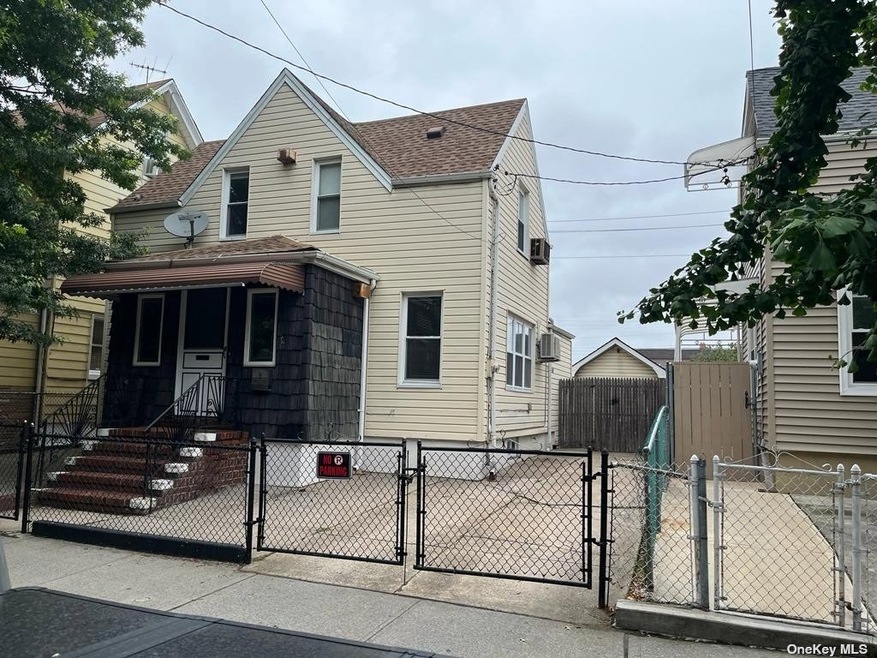 10733 93rd St, Ozone Park, NY 11417 - photo 1