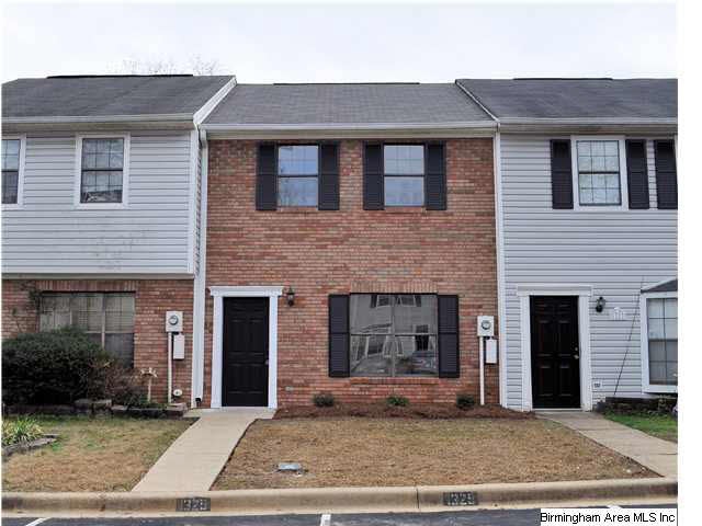 Stately, brick townhome. Two reserved parking spac