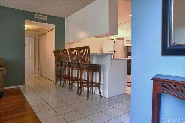 View of the hallway and kitchen breakfast counter 
