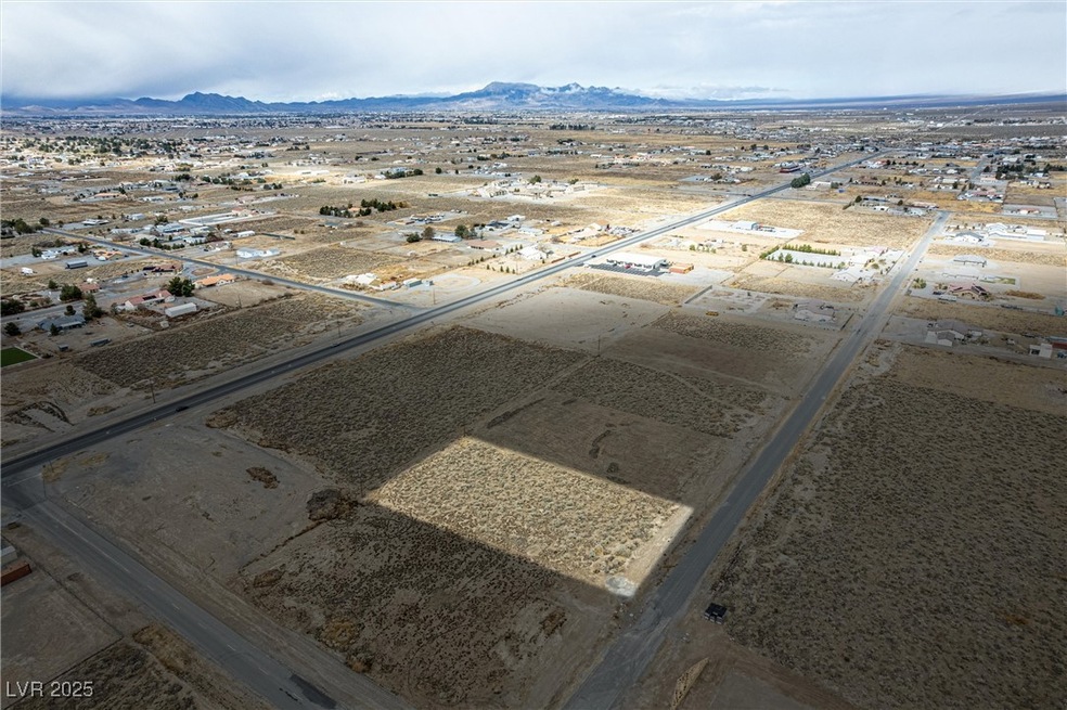 Aerial view with view of desert and a mountain vie