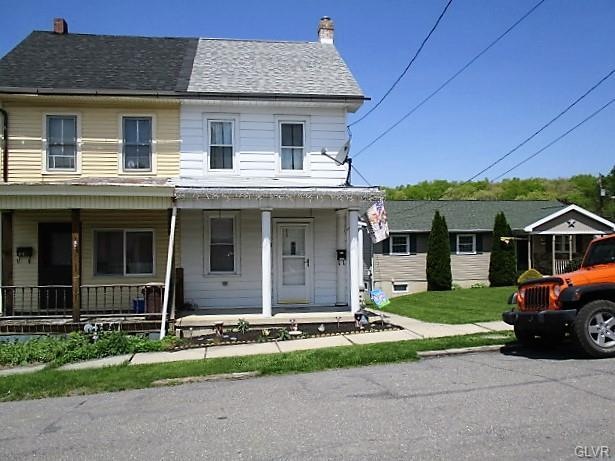 Front view of 523 Lehigh, covered front porch to e